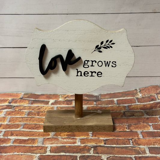 Love Grows Here Sign