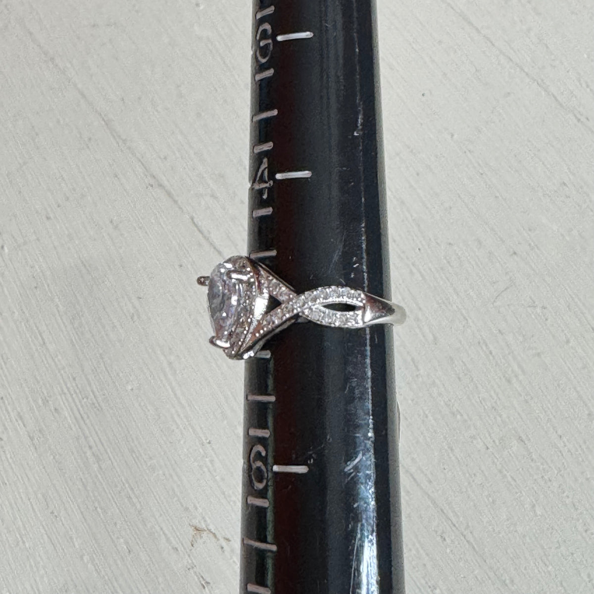 Pear Cut Halo Engagement Ring With Twisted Infinity Split Shank Band - Size 5