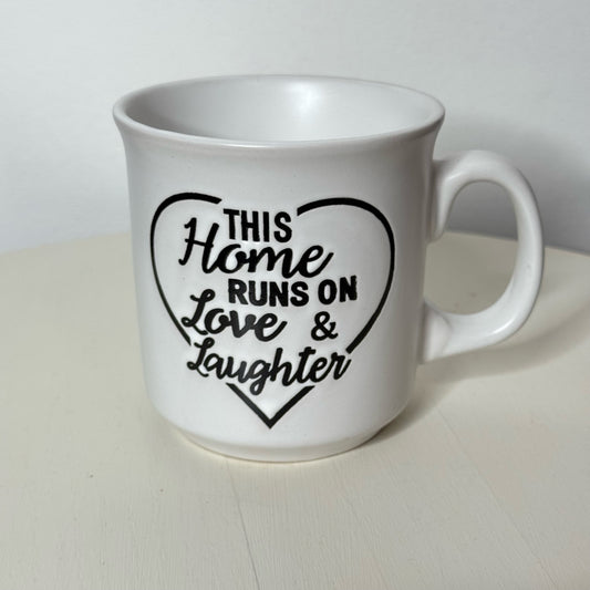 This Home Runs on Love & Laughter Mug