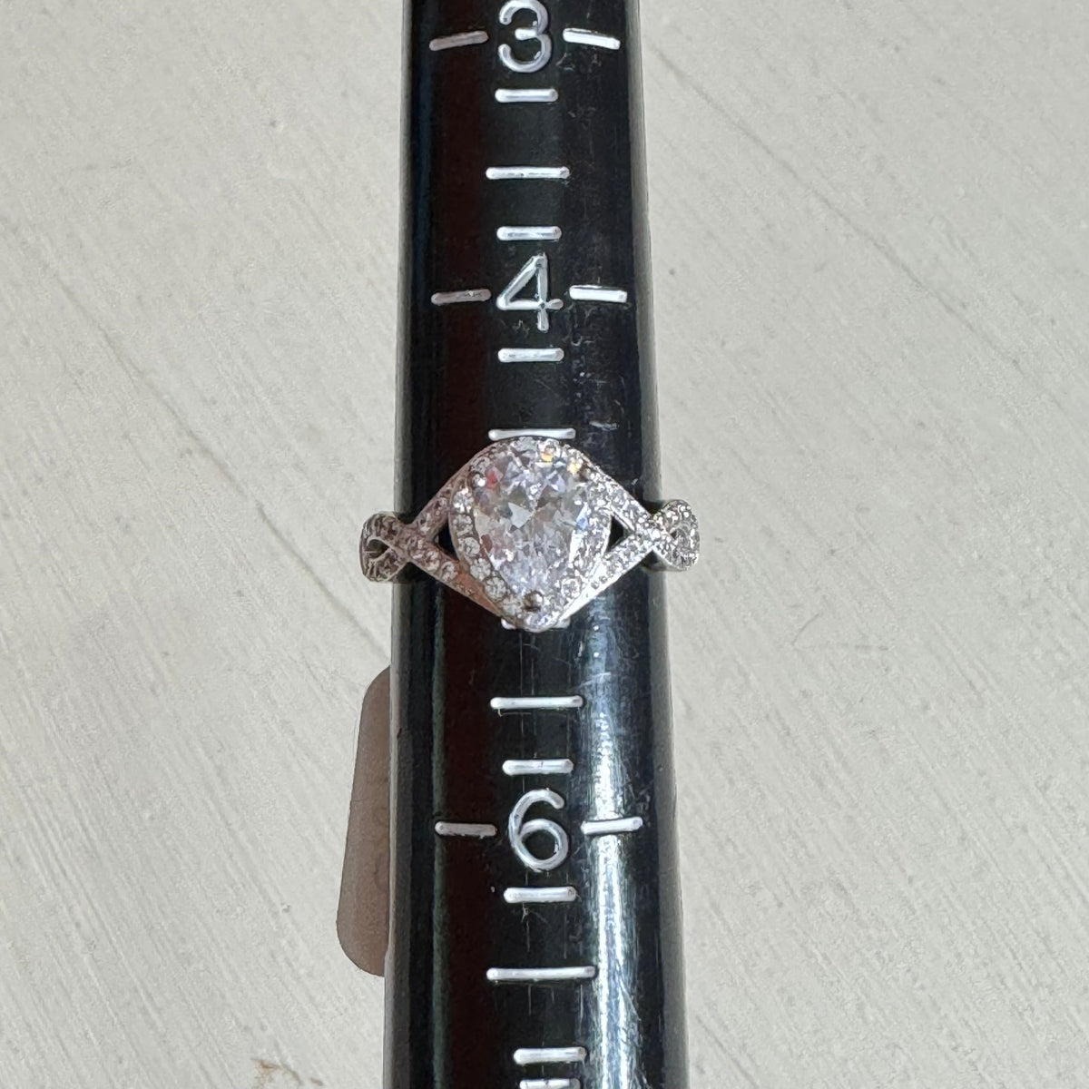 Pear Cut Halo Engagement Ring With Twisted Infinity Split Shank Band - Size 5