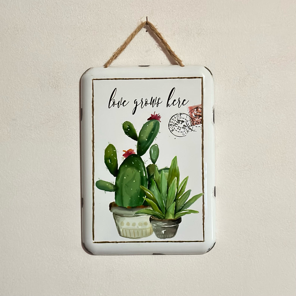 Love Grows Here Metal Sign