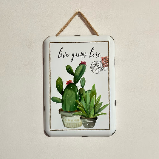 Love Grows Here Metal Sign